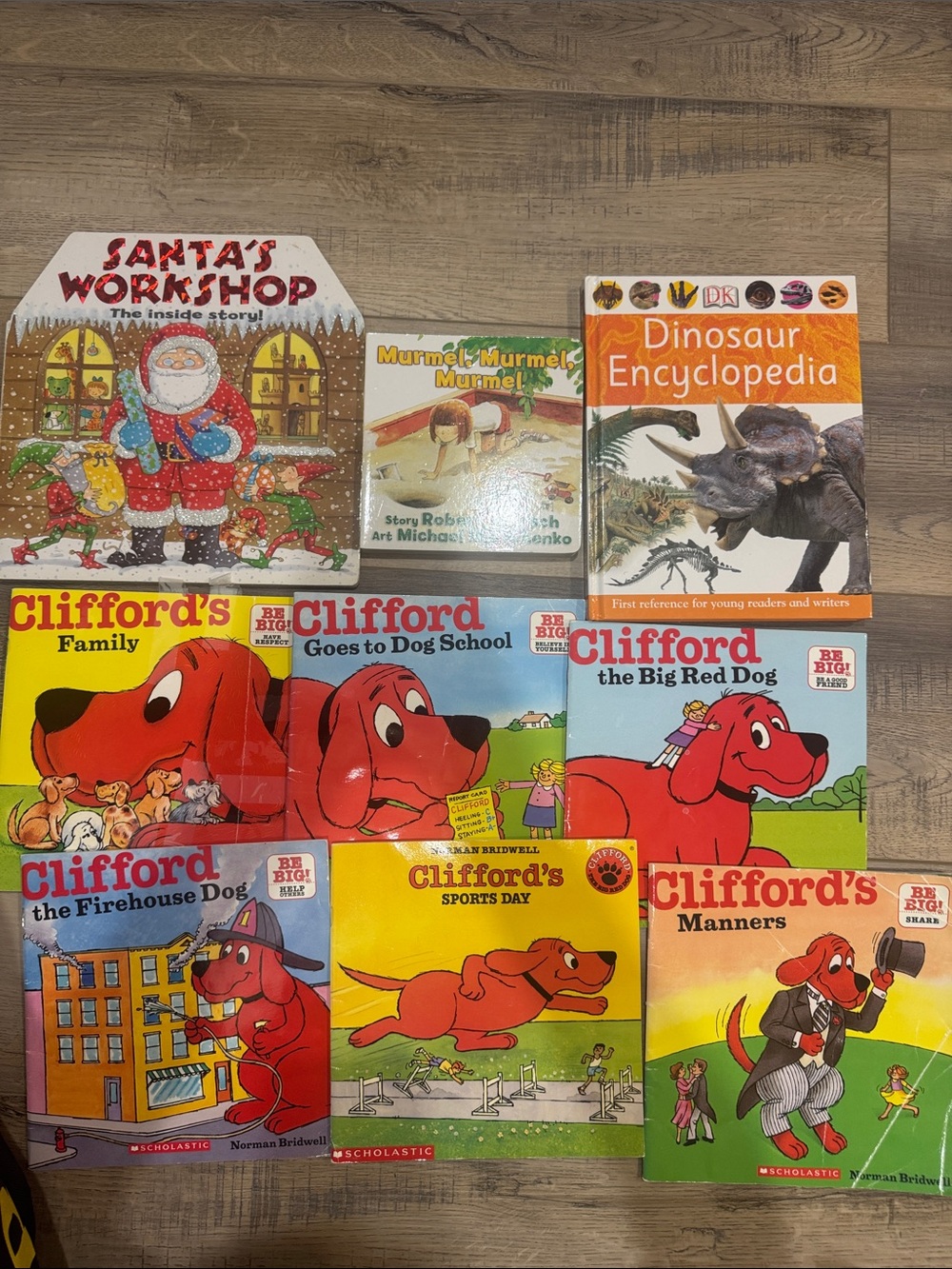 Lot of 9 books Clifford Robert munch dinosaur